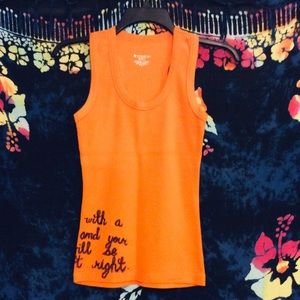 Women’s tank top with a quote on it.